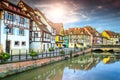 Famous medieval half-timbered facades reflecting in water, Colmar, France Royalty Free Stock Photo