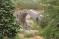 The famous Mesi bridge in Mes, Albania. Royalty Free Stock Photo