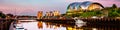 Famous Millennium bridge at sunset. Illuminated landmarks with river Tyne in Newcastle, UK Royalty Free Stock Photo