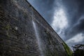 Ancient city wall spitting out when it rains