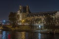 Famous Monuments in Paris at Night Traffic Seine River and Docks