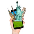 Famous monuments of the world going out of a mobile phone on whi Royalty Free Stock Photo