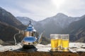 Famous Moroccan mint tea and silver kettle in High Atlas mountains Royalty Free Stock Photo