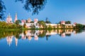 The famous Moscow landmark with Golden domes and a reflection of the landscape on the water of the Park pond against the