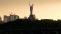 Famous Motherland Monument Rodina mother during summer sunset.