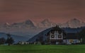 The 3 famous mountain peaks in the Bernese Alps Eiger, MÃÂ¶nch and Jungfrau seen from the Wabern / Bern district at night Royalty Free Stock Photo