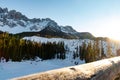 The famous mountains latemar in south tyrol, italy, with the frozen lake karersee in the front Royalty Free Stock Photo