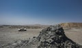 The mud volcanoes of gobustan with a Lada, Azerbaijan Royalty Free Stock Photo