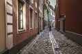 Famous narrow medieval architecture building street in old town Royalty Free Stock Photo