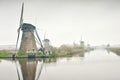 The Famous Netherlands wooden Windmills, UNESCO World Heritage Site, Kinderdijk Windmill village in sunset light of