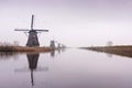 The Famous Netherlands wooden Windmills, UNESCO World Heritage Site, Kinderdijk Windmill village in sunset light of