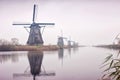 The Famous Netherlands wooden Windmills, UNESCO World Heritage Site, Kinderdijk Windmill village in the soft sunset light of