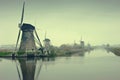 The Famous Netherlands wooden Windmills, UNESCO World Heritage Site, Kinderdijk Windmill village in the soft sunset light of