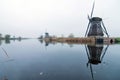 The Famous Netherlands wooden Windmills, UNESCO World Heritage Site, Kinderdijk Windmill village in the soft sunset light of