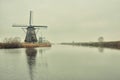The Famous Netherlands wooden Windmills, UNESCO World Heritage Site, Kinderdijk Windmill village in the soft sunset light of