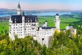 Famous Neuschwanstein Castle, fairy-tale palace on a rugged hill above the village of Hohenschwangau near Fussen