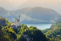 Famous Neuschwanstein Castle, fairy-tale palace on a rugged hill above the village of Hohenschwangau near Fussen