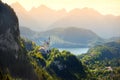 Famous Neuschwanstein Castle, fairy-tale palace on a rugged hill above the village of Hohenschwangau near Fussen Royalty Free Stock Photo