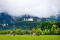 Famous Neuschwanstein Castle, fairy-tale palace on a rugged hill above the village of Hohenschwangau near Fussen