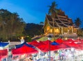 Famous night market and the Haw Pha Bang temple in Luang Praban