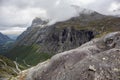 Famous norwegian mountains road Trollstigen. Top view of valley from big grey rock Royalty Free Stock Photo