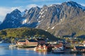 Famous Norwegian Reine The Fishing village  , Lofoten Islands,  Norway. Mountains With Snow In Background, Royalty Free Stock Photo