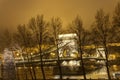 Famous old chain bridge in Budapest behind trees at night Royalty Free Stock Photo