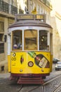 Famous old historic tourist yellow tram in Lisbon Royalty Free Stock Photo