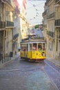 Famous old historic tourist yellow tram in Lisbon Royalty Free Stock Photo