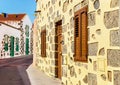 Famous old town of Aguimes. Street with typical old colorful canarian houses.
