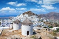 Old windmills over the town of Ios island Royalty Free Stock Photo