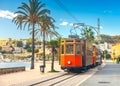 The famous orange tram runs from Soller to Port de Soller, Mallorca, Spain Royalty Free Stock Photo