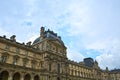 Famous Paris Louvre. People in main courtyard Cour Napoleon with Louvre Museum with Louvre Pyramid