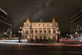 Famous Paris Opera at Night, lights of the traffic leading around Royalty Free Stock Photo