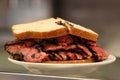 Famous Pastrami on rye sandwich served in New York Deli Royalty Free Stock Photo