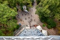 Famous Petrin Tower from above and tourists in the park