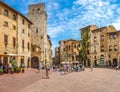 Famous Piazza della Cisterna in historic San Gimignano, Tuscany, Italy Royalty Free Stock Photo