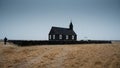 Black church of Budir in Iceland during winter