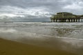 The famous pier Scheveningen in Hague . On a cloudy day. Netherlands. Royalty Free Stock Photo