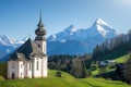 Famous pilgrimage church Maria Gern with snow capped Watzmann mountain top Royalty Free Stock Photo