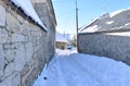 Famous Piornedo mountain village after a snowfall with ancient round Palloza stone houses with thatched roofs. Lugo, Spain. Royalty Free Stock Photo