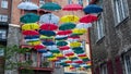 Famous place in the old Quebec City with umbrellas
