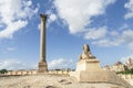 The famous Pompey pillar with sphinx in the Upper Egyptian city of Alexandria. A popular travel destination. day and blue sky. A Royalty Free Stock Photo