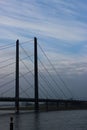 Famous Pont sur le Rhin (Rheinkniebrucke) bridge in Dusseldorf, Germany under bright cloudy sky Royalty Free Stock Photo