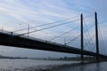 Famous Pont sur le Rhin (Rheinkniebrucke) bridge in Dusseldorf, Germany under bright cloudy sky Royalty Free Stock Photo