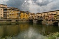 Famous Ponte Vecchio bridge and cityscape view of old town Florence by Arno river in Florence, Italy Royalty Free Stock Photo
