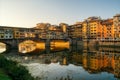 Famous Ponte Vecchio bridge over Arno river in Florence, Italy at sunrise Royalty Free Stock Photo