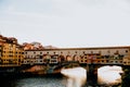 Famous Ponte Vecchio bridge with river Arno at sunset in Florence, Italy Royalty Free Stock Photo