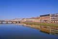 The famous Ponte Vecchio, the Old Bridge and city houses with reflections in the Arno River, Florence, Tuscany, Italy Royalty Free Stock Photo