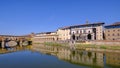 The famous Ponte Vecchio, the Old Bridge and city houses with reflections in the Arno River, Florence, Tuscany, Italy Royalty Free Stock Photo